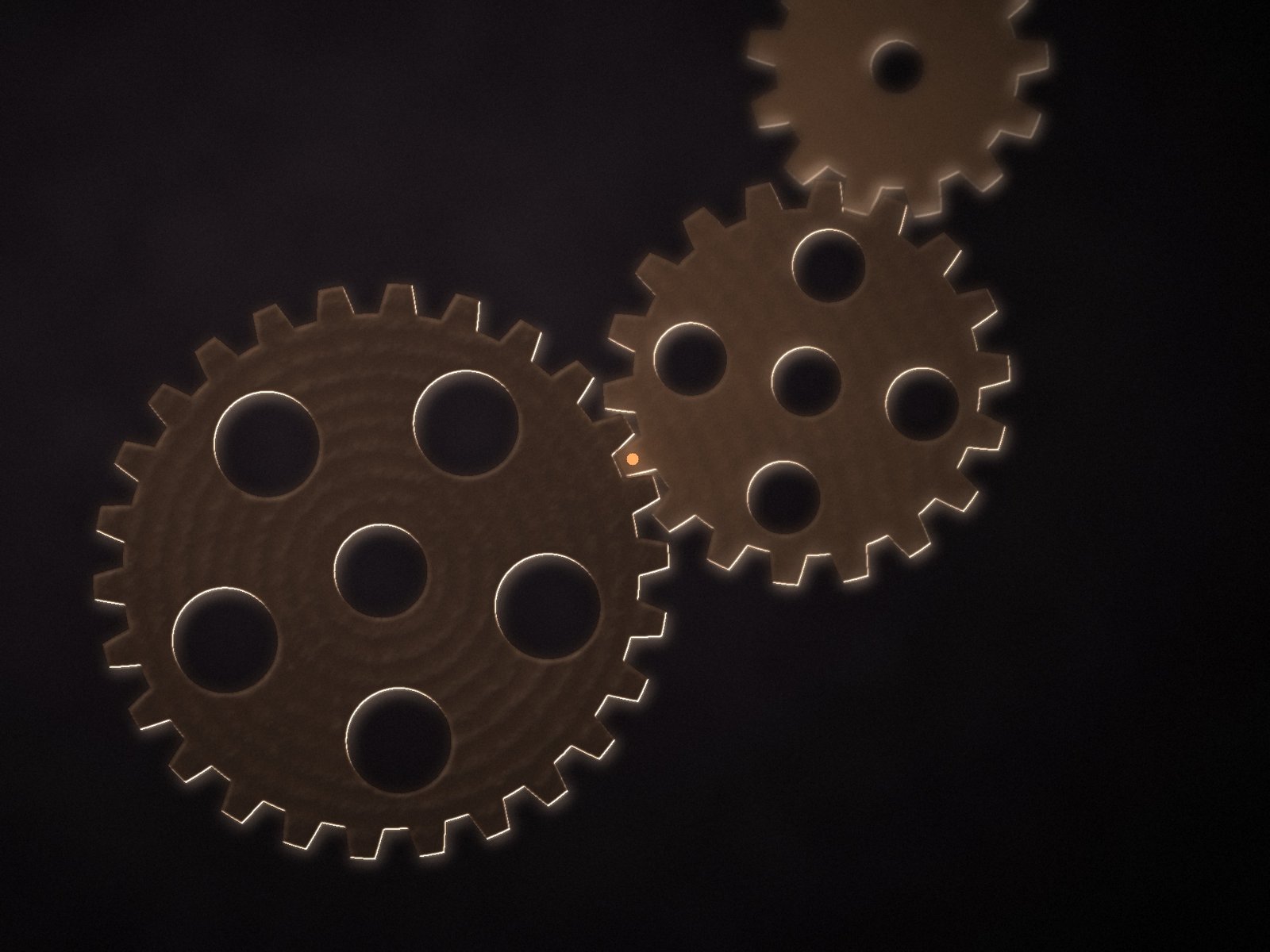 Three interlocking gears, a point of light where two of them meet